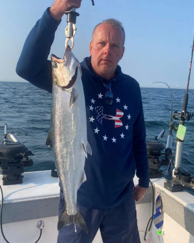 Customers fishing on Lake Ontario Fishing Charter