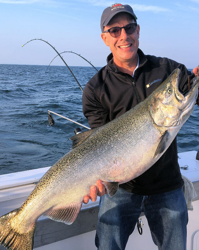 Customers fishing on Lake Ontario Fishing Charter