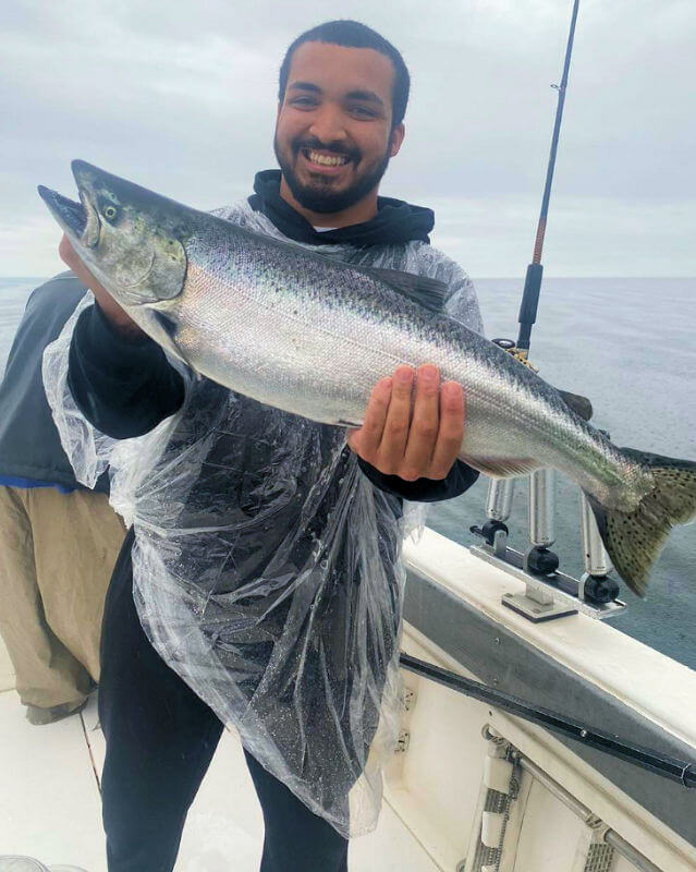 Customers fishing on Lake Ontario Fishing Charter