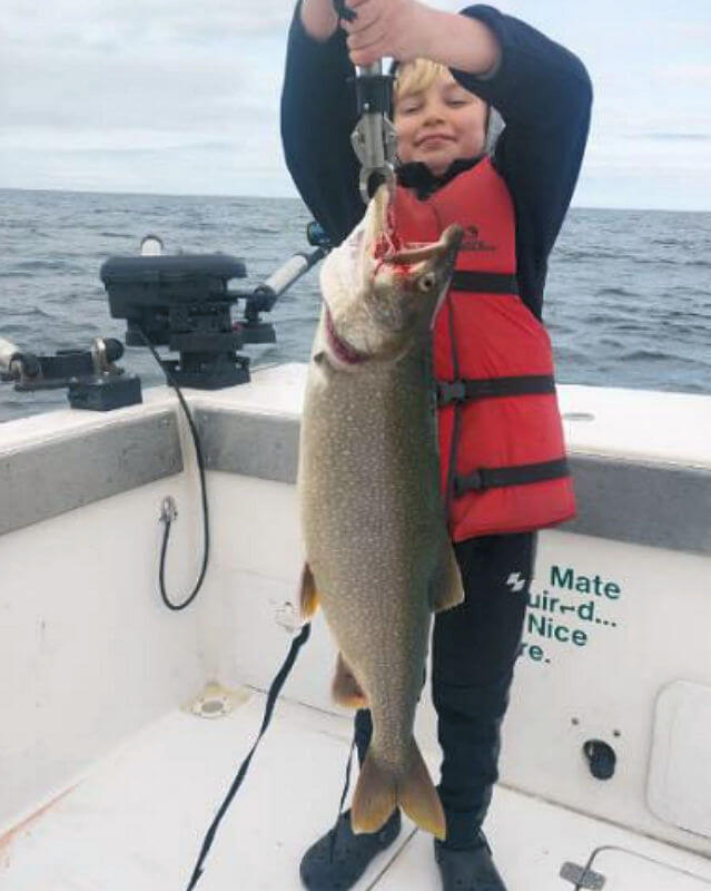 Customers fishing on Lake Ontario Fishing Charter