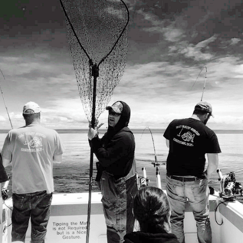 Customers fishing on Lake Ontario Fishing Charter