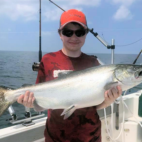 Customers fishing on Lake Ontario Fishing Charter